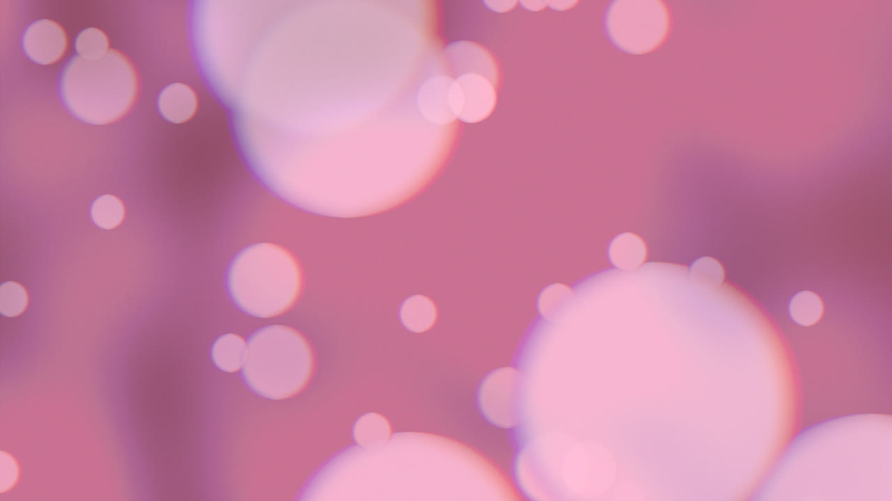 Blurred pink background with scattered circles ideal for web design