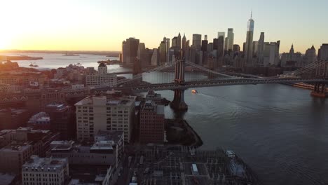 very good aerial over lower manhattan new york, brooklyn bridge, manhattan bridge and east river