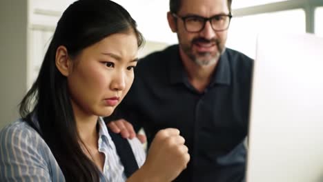 a woman appears frustrated while discussing a project with a male colleague in an office environment. tensions rise as they address challenges and seek solutions together.