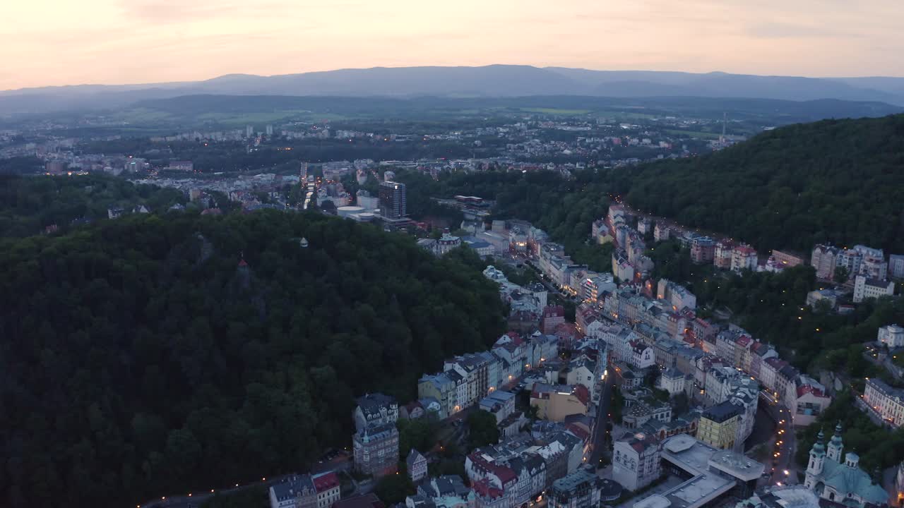 Aerial View over a Small European Town on the Mountain Side