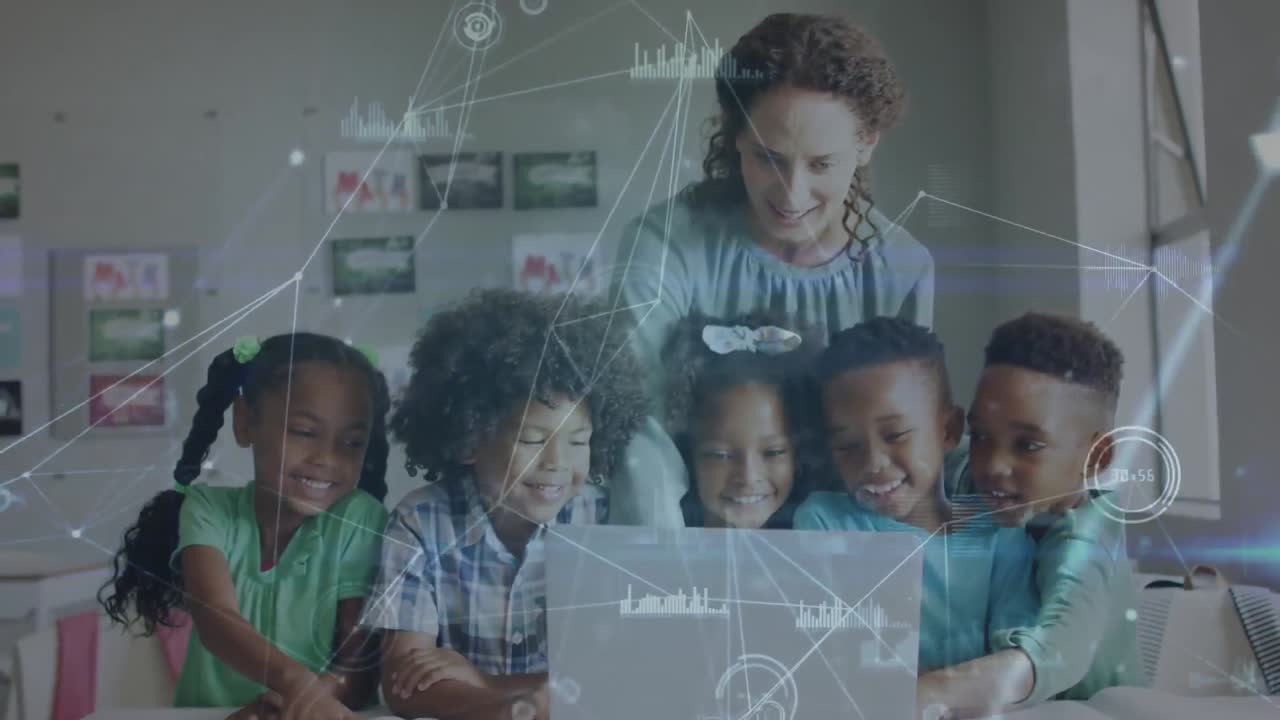 Animation of data processing over happy diverse female teacher and pupils using laptop in class