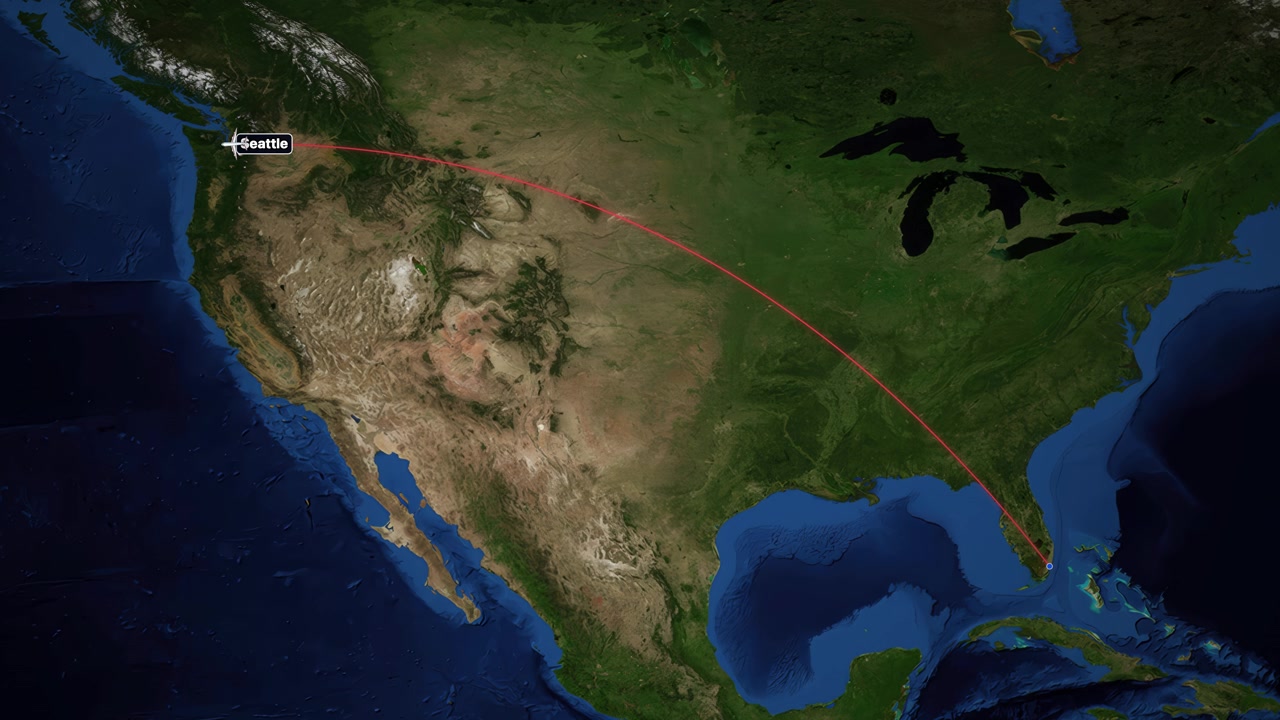 Satellite map animation tracks a red flight path from Miami to Seattle across North America