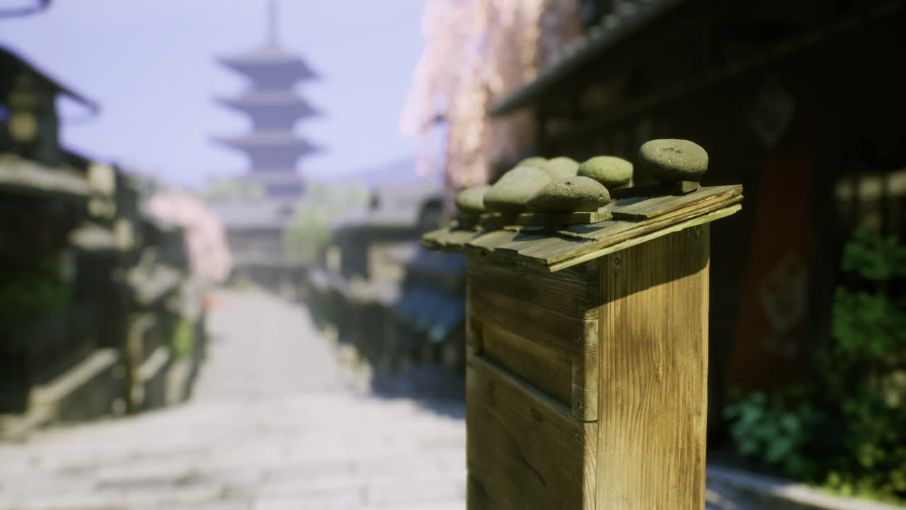 Traditional wooden mailbox at a serene street in a historic town during spring