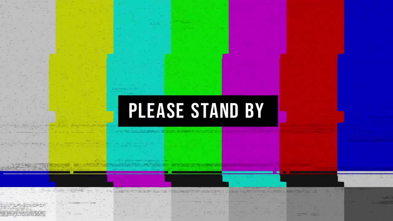 Monoscopio televisivo con rumore statico e scritta 'Attendere prego'