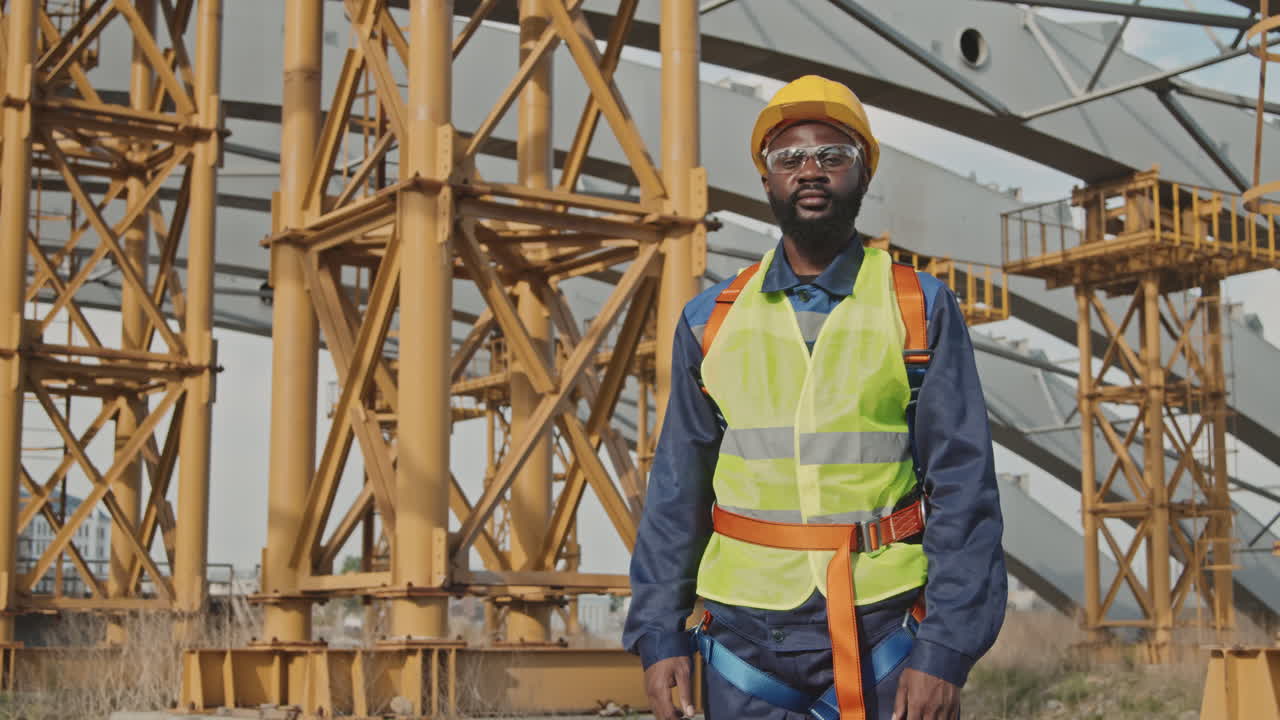 Worker Posing at Construction Site