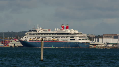 a shot of a single cruise ship moored up at southampton cruise terminal