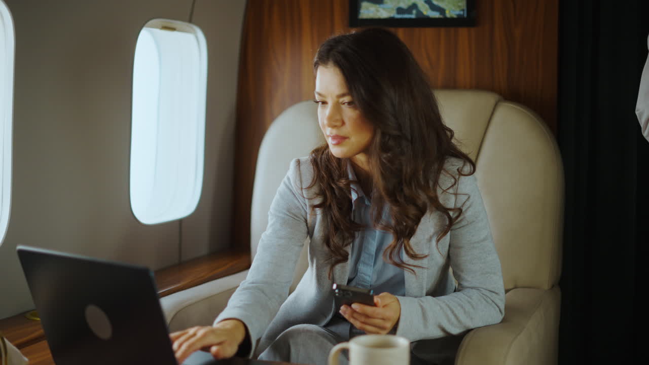 Business professionals traveling on a private jet