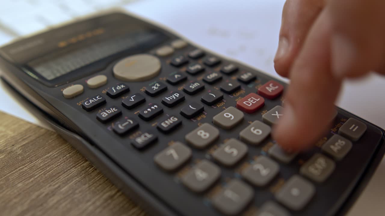 Accounting Close Up Shot; Accountant Using Calculator Close Up Shot, university exam using caculatorclose up shot of calculator using on desk