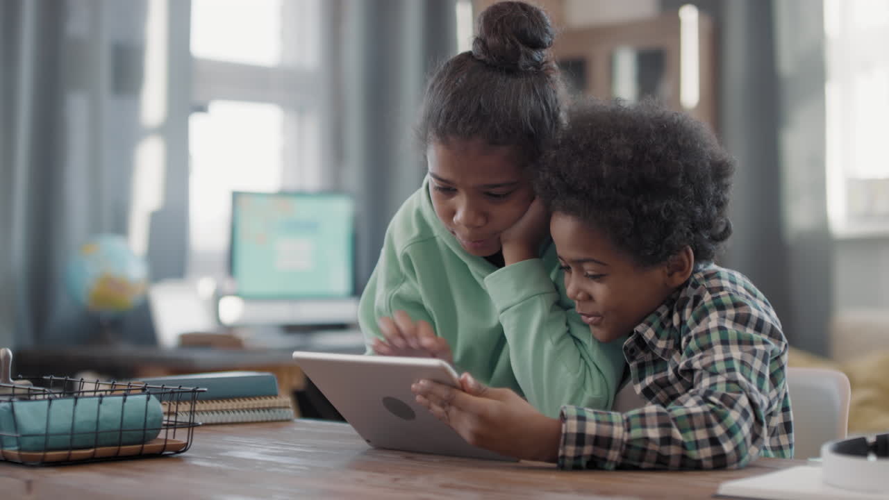 Afro Kids Playing Digital Tablet Together