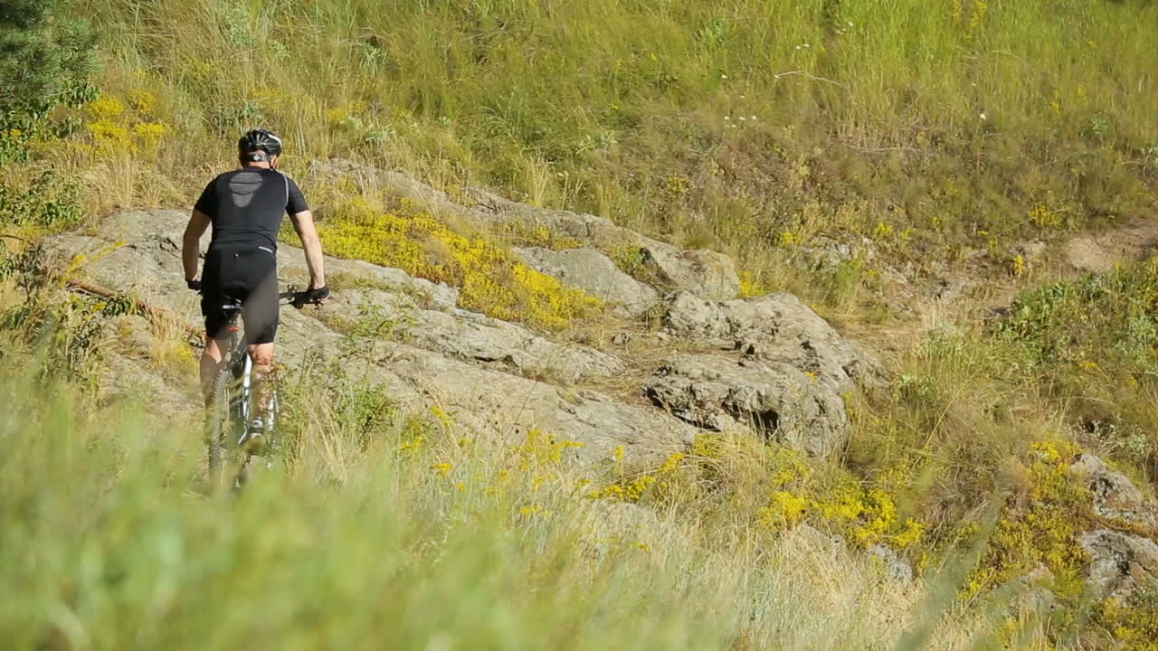 Man Bike On Nature. Active man cyclists bicycle riders in wild nature