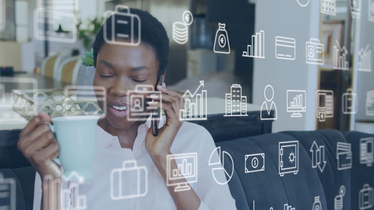 Animation of financial icons over african american woman having call