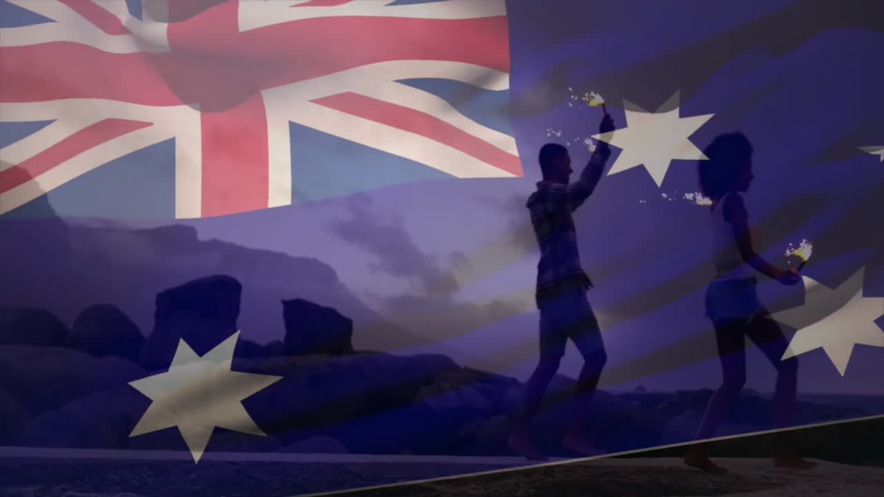Celebrating with sparklers, silhouetted people overlaid with Australian flag animation