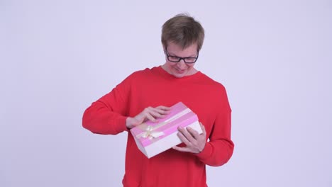 studio shot of young handsome man