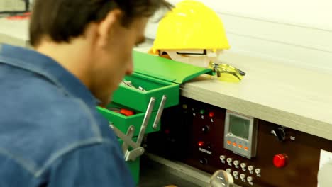 male worker working at desk in office 4k