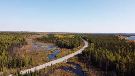 desert-road-of-Eeyou-Istchee-Baie-James-Quebec-Canada-in-fall