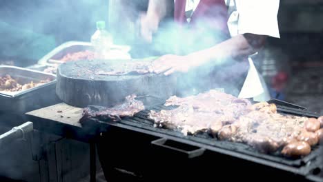 Cook-chopping-in-pieces-meat