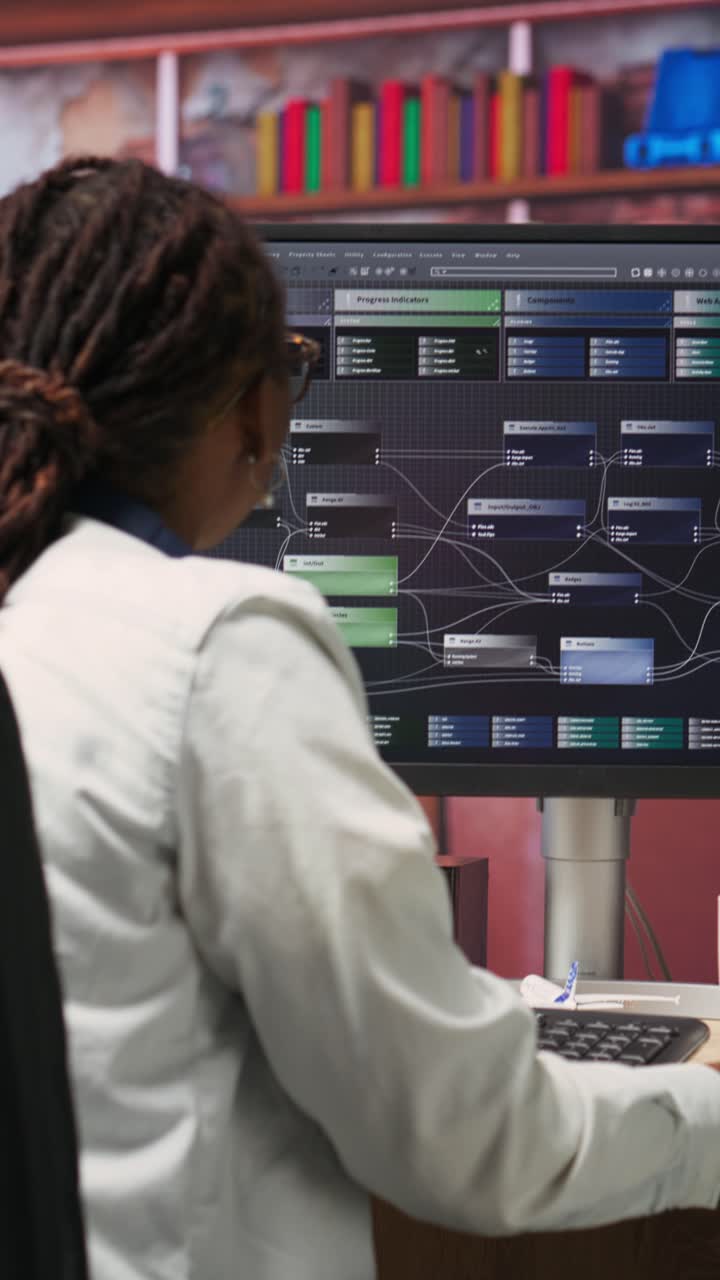 Vertical video Woman working with AI machine learning software on PC