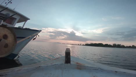 point of view from inside of a sailing fishing boat