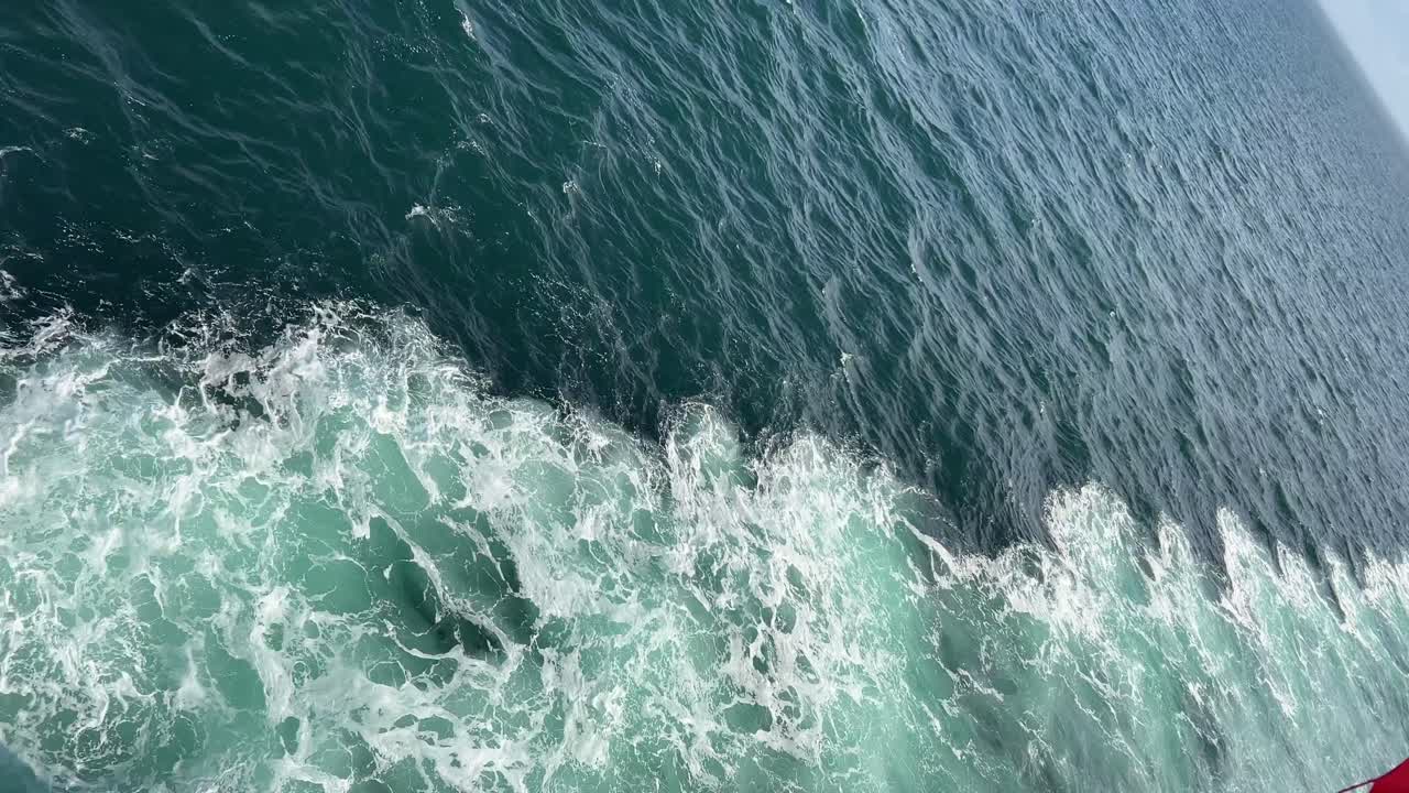 ferry travelling the English channel. Blue water giving rise to a white waves
