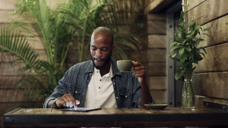 handsome young man drinking coffee