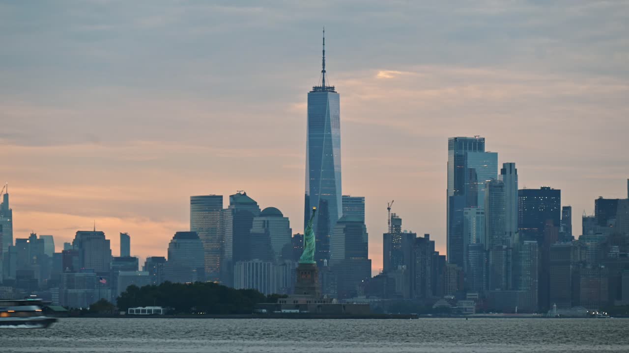 A Timelapse taken from New Jersey showcasing the iconic Manhattan City skyline with the State of Liberty at sunrise