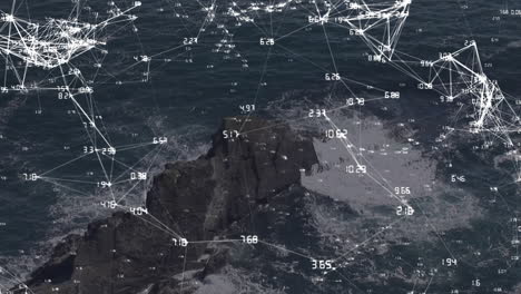 red de conexiones y animación de datos numéricos sobre la costa rocosa y el océano