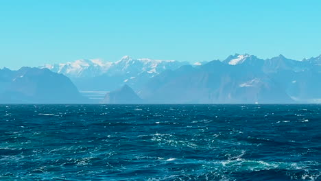 Slow-motion-of-view-of-mountains-from-ship-in-East-Greenland