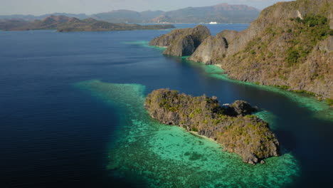 malwawey coral garden, banul beach and rocks in the coast of coron island, palawan, philippines