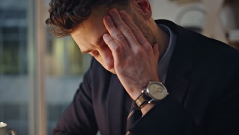 employee hands closing laptop after late work in office closeup. tired manager