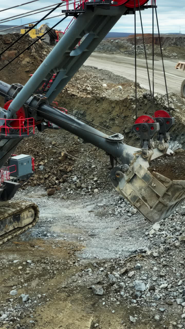 Giant mining excavator digging in an open pit