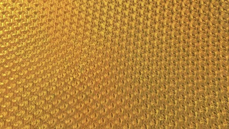 golden foil background. gold texture 3d rendering loop 4k