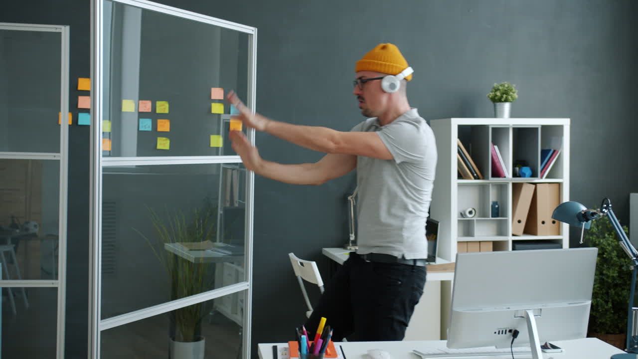 Man Dancing in Office