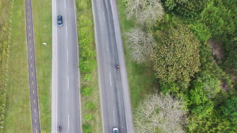 Overhead-drone-video-of-the-road-while-drone-follows-vehicle