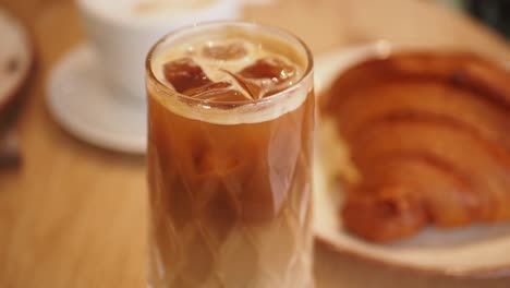 iced coffee with croissant