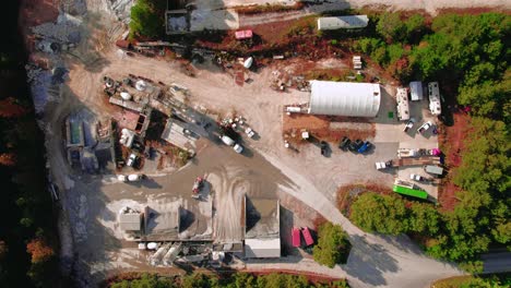 stunning aerial tour of ready mix cement supplier with mixer trucks loading wet concret