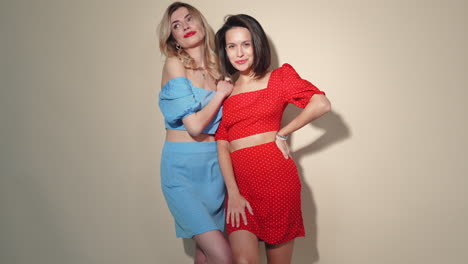 two friends in matching outfits
