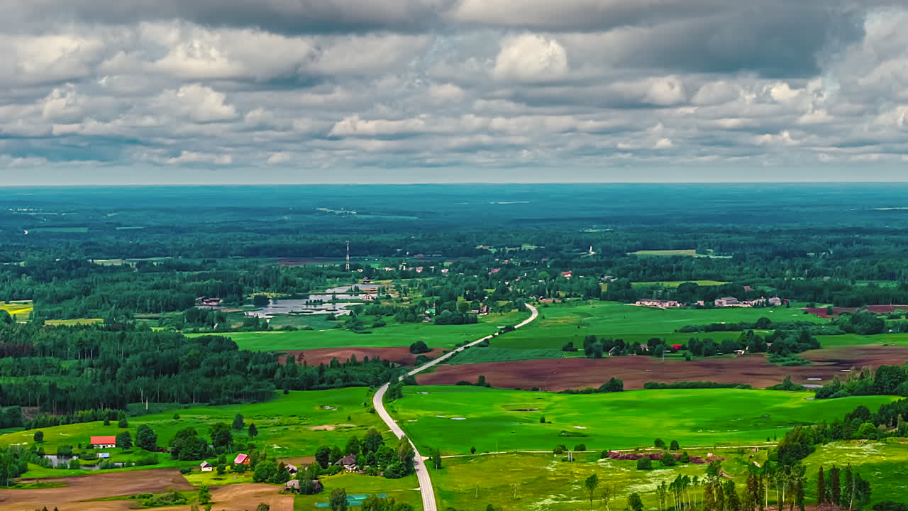 Time Lapse storm clouds rural field aerial drone farmland landscape farm agriculture