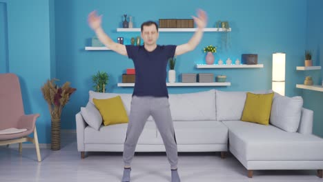 mature man doing pre-workout exercise at home.