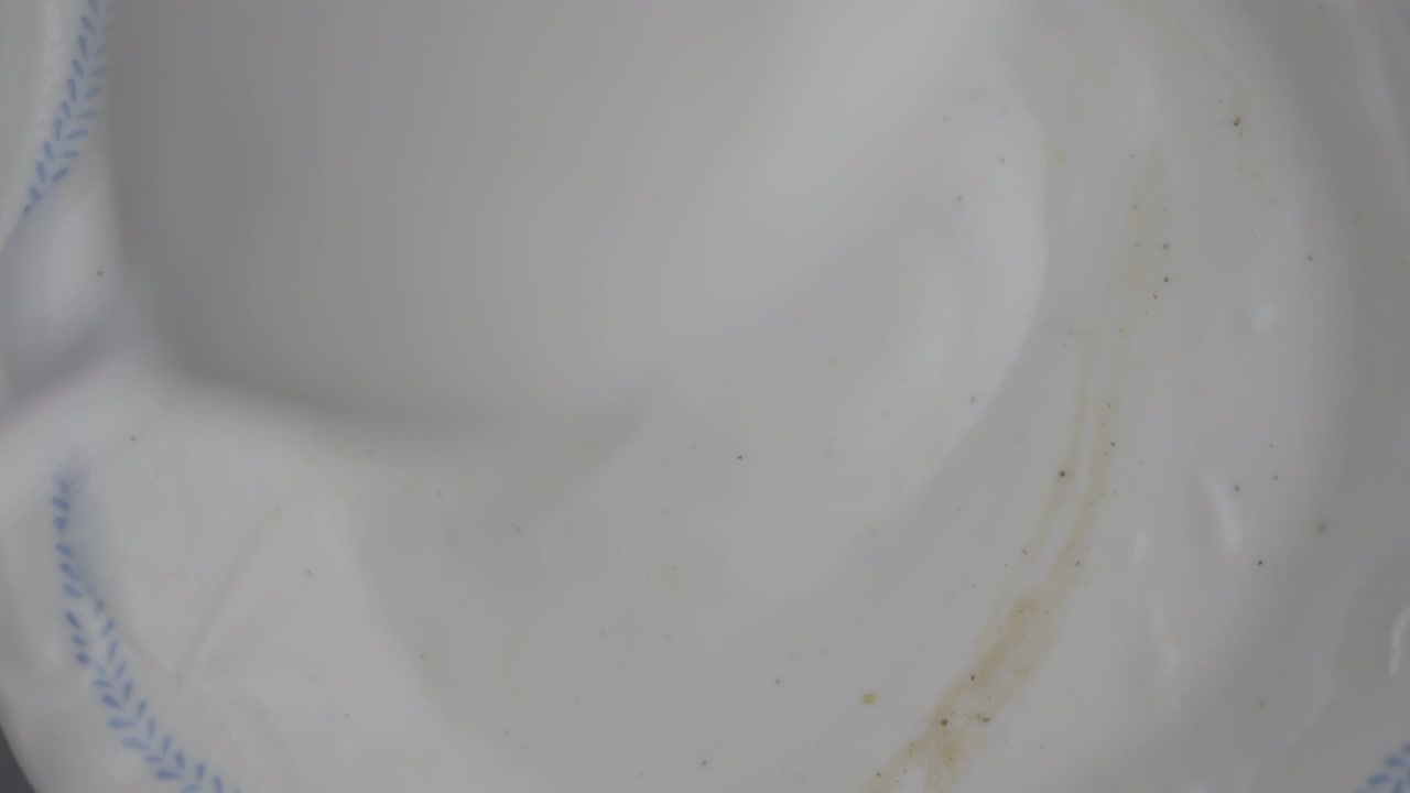 Close-up of yogurt being scooped with a spoon