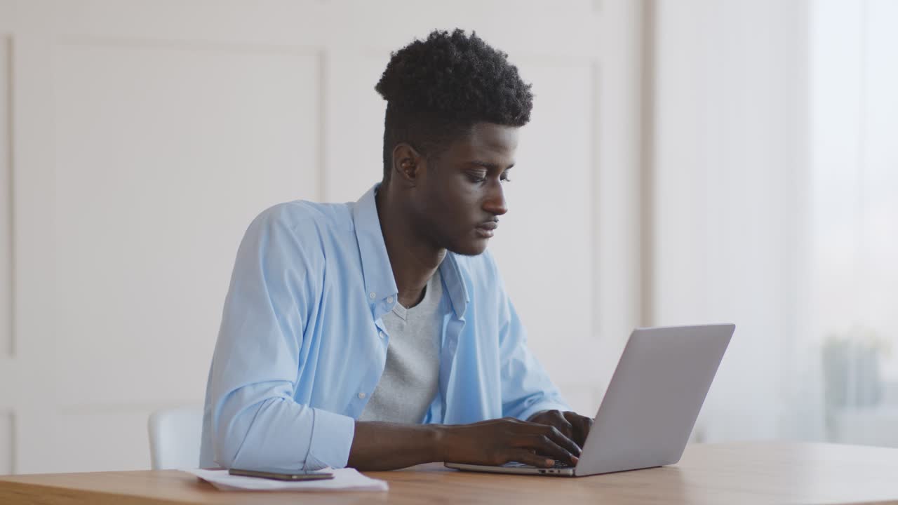 Man working and relaxing at his home office