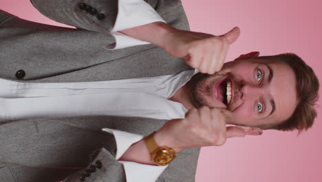 Handsome-business-man-shouting,-raising-fists-in-gesture-I-did-it,-celebrating-success,-winning