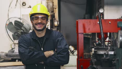 young factory worker or engineer close up portrait in factory