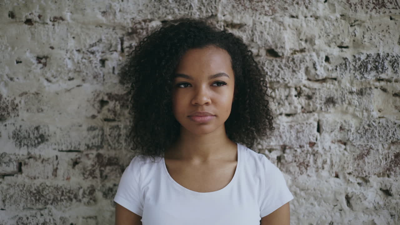 Surprised Woman with Hand on Mouth