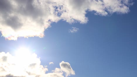 time lapse of blue sky and clouds with sunlight