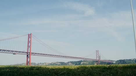 view of the 25 de abril bridge in lisbon, portugal