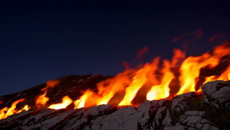 fiery mountain at night