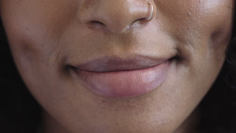 close-up-of-african-american-woman-lips-smiling-happy-beautiful-perfect-skin-wearing-nose-ring