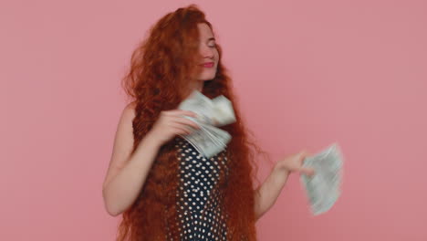 Redhead-girl-holding-cash-money-dollar-celebrate-dance,-success-business-career,-lottery-game-winner