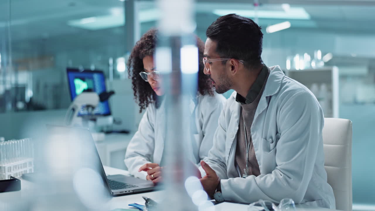 Scientists collaborating in a laboratory