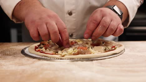 chef preparing a pizza